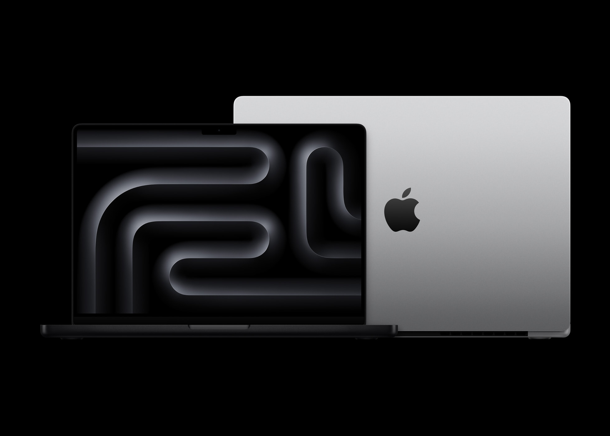 Apple MacBook Pro lineup in Space Black and Silver on a dark background